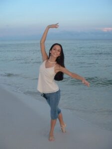 Cody dancing on the beach