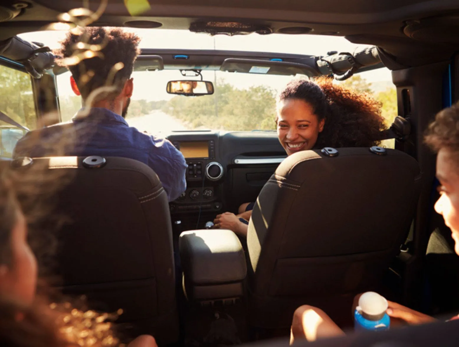 young black family on a summer road trip