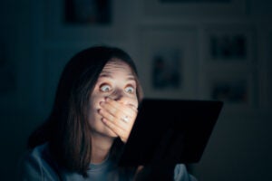 Strange Creature Amarillo Shocked Woman Reading News on Pc Tablet